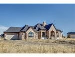 Property Photo: 242208 WINDHORSE WY in Rural Rocky View County